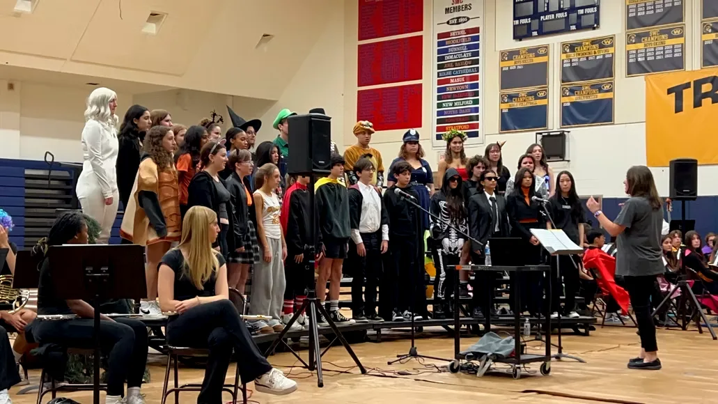 Weston students performing a full-cast musical theatre number