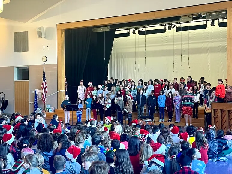 Weston choir singing on stage